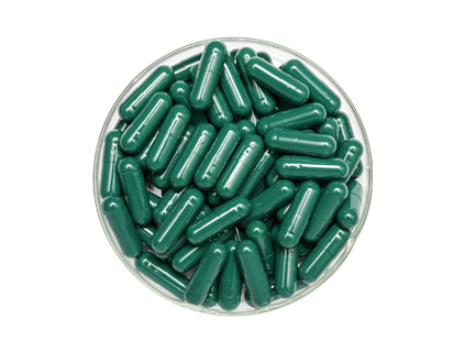 Dark green capsule