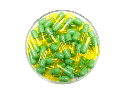 Green cap yellow transparent core capsule