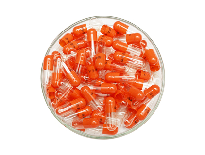 Orange cap transparent core capsule